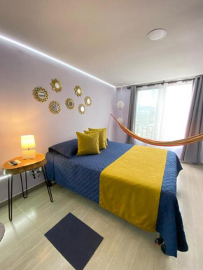 Suite con hamaca y baño privado.